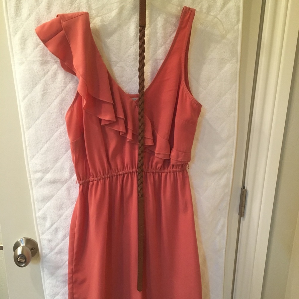 Coral colored dress with ruffle shoulder